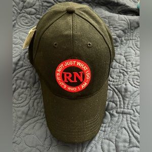 NWT hat.  RN-it’s not just what I do, it’s who I am Velcro adjustable hat.